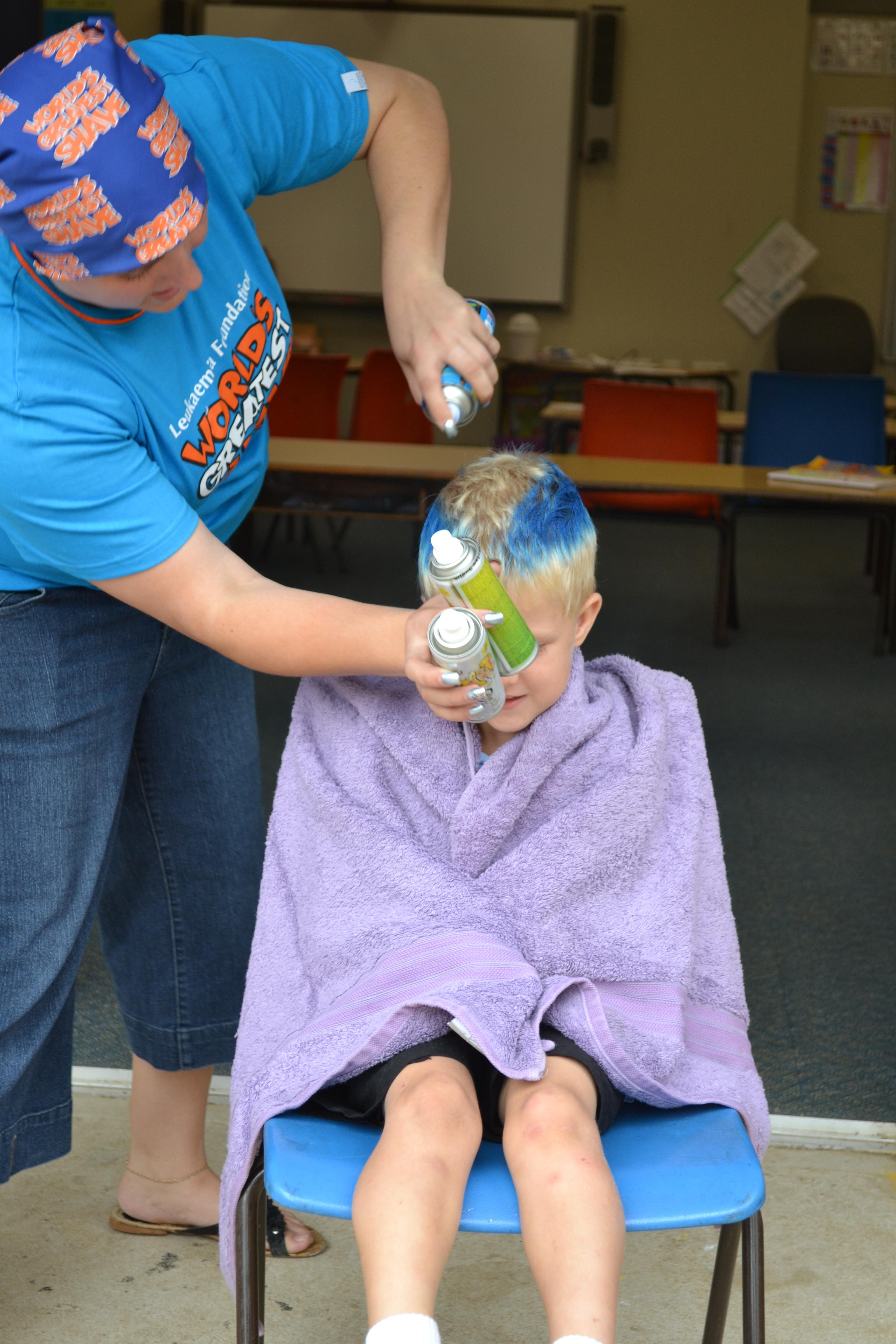 students getting hair coloured for worlds greatest shave