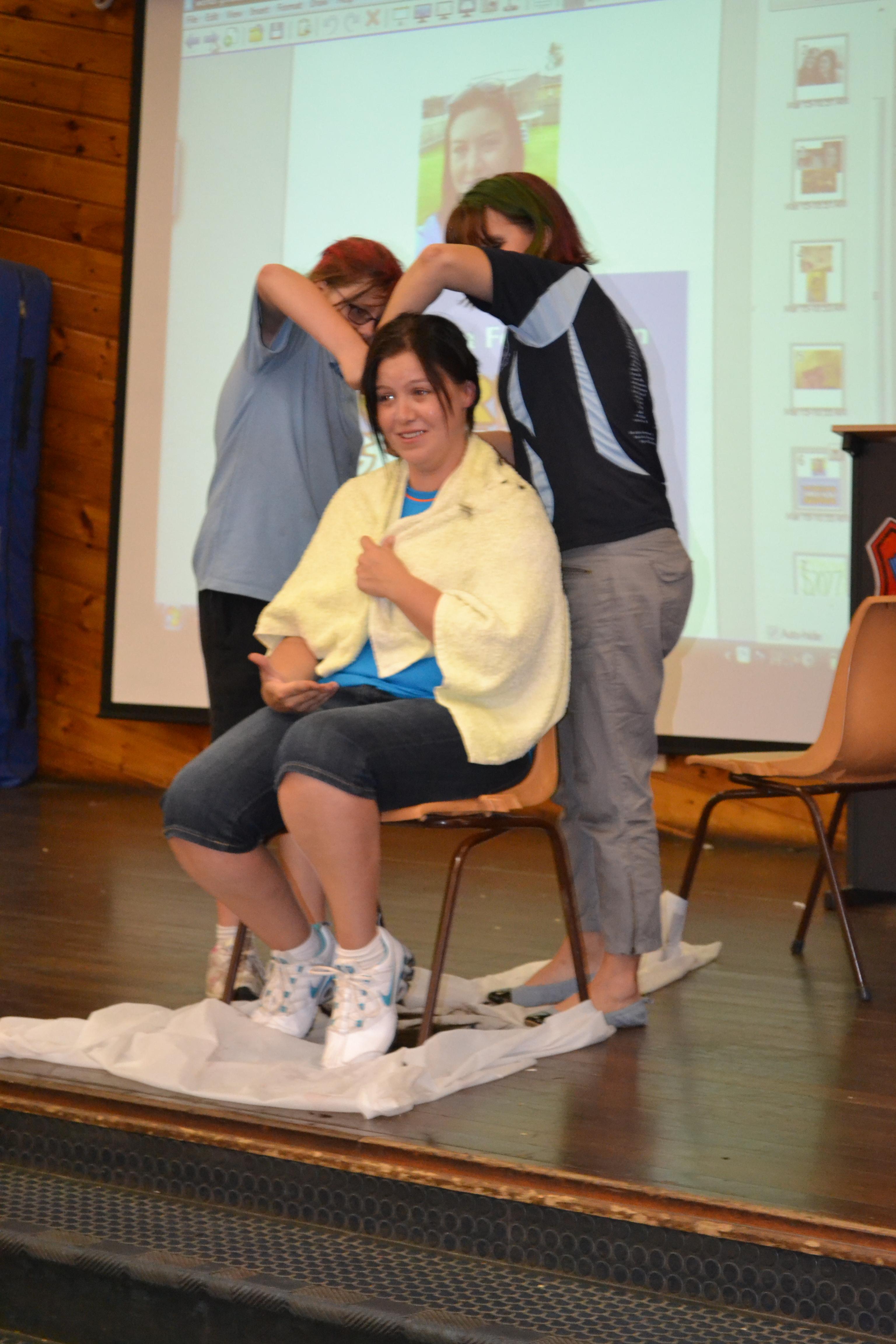 students cut off teachers hair